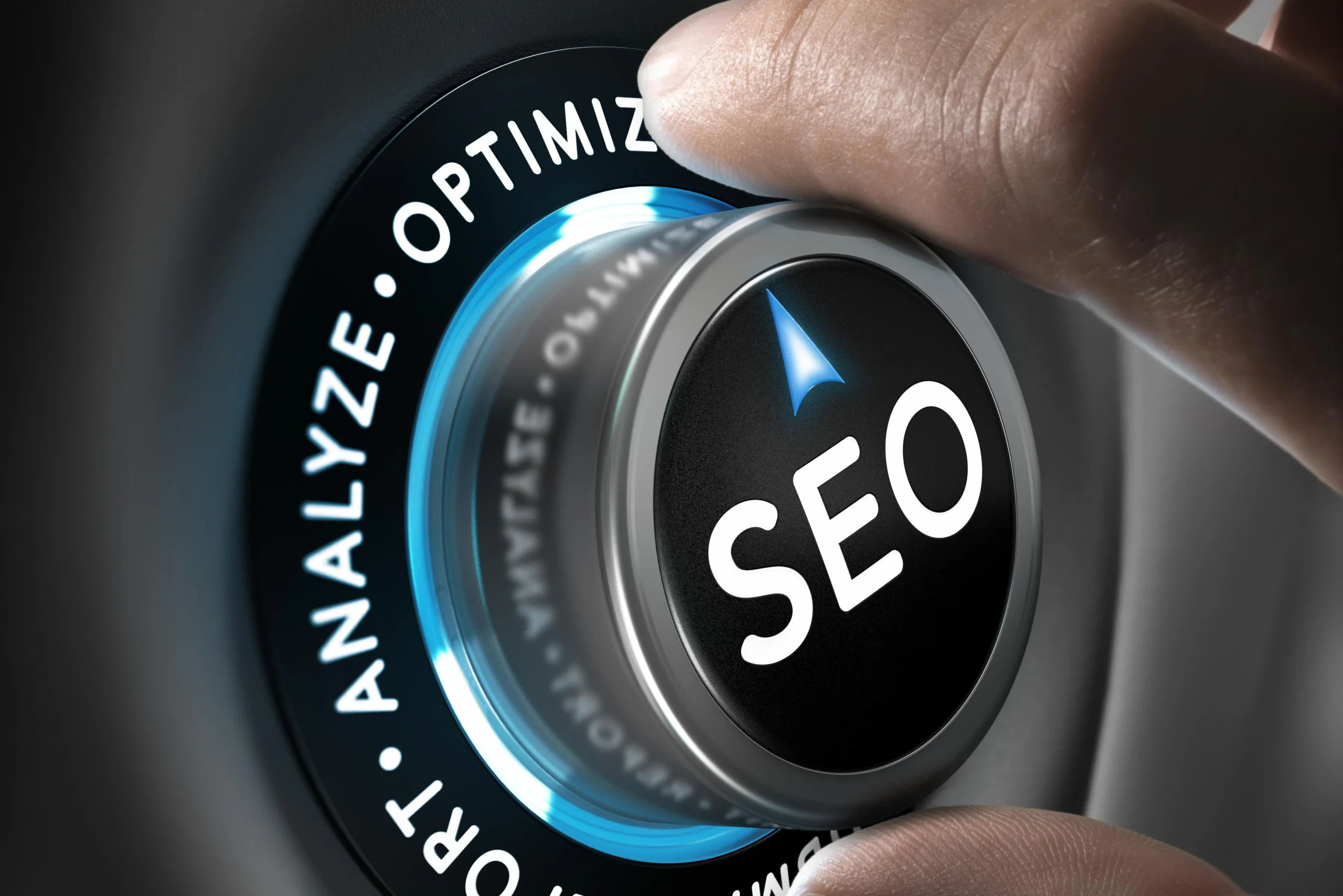 A hand turns a labeled SEO dial set to Analyze and Optimize, reflecting NYC SEO company expertise.
